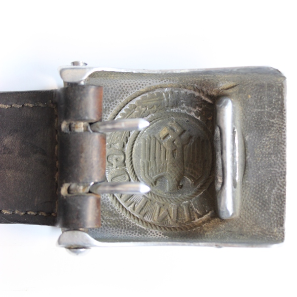 Wehrmacht EM/NCO’s pebbled aluminum belt buckle w/ Leather tab - F.W. Assmann & Sohne