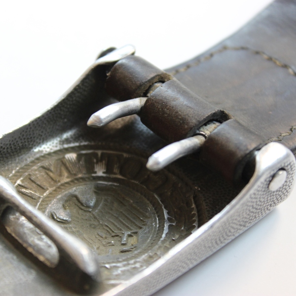 Wehrmacht EM/NCO’s pebbled aluminum belt buckle w/ Leather tab - F.W. Assmann & Sohne