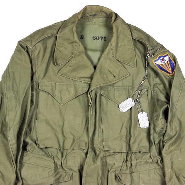 M1943 field jacket w/ 4th AF patch and dog tags